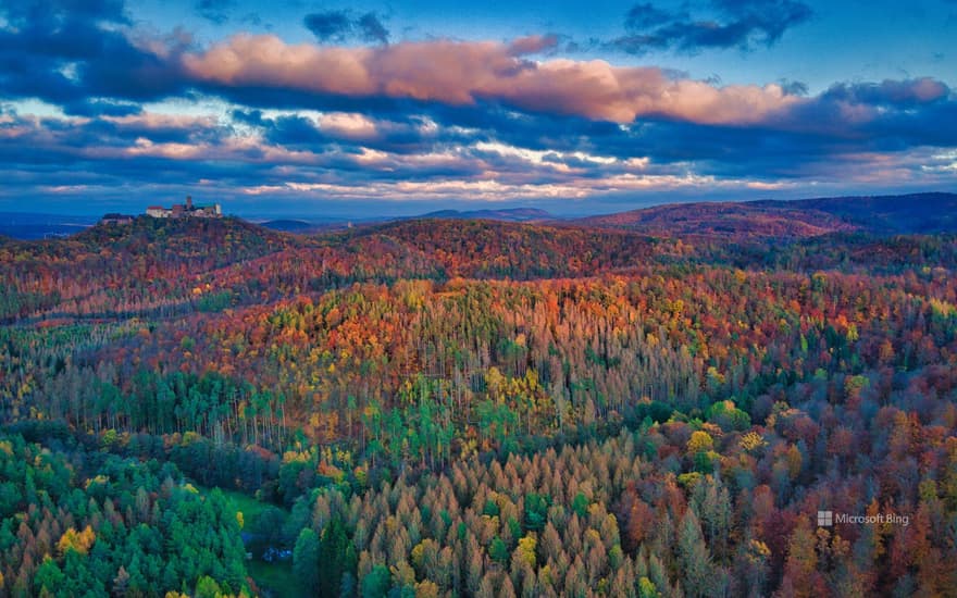 Thuringian Forest in autumn with Wartburg Castle, Germany